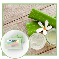 Aloe vera wax melts with aloe vera leaves and a flower on a wooden surface.