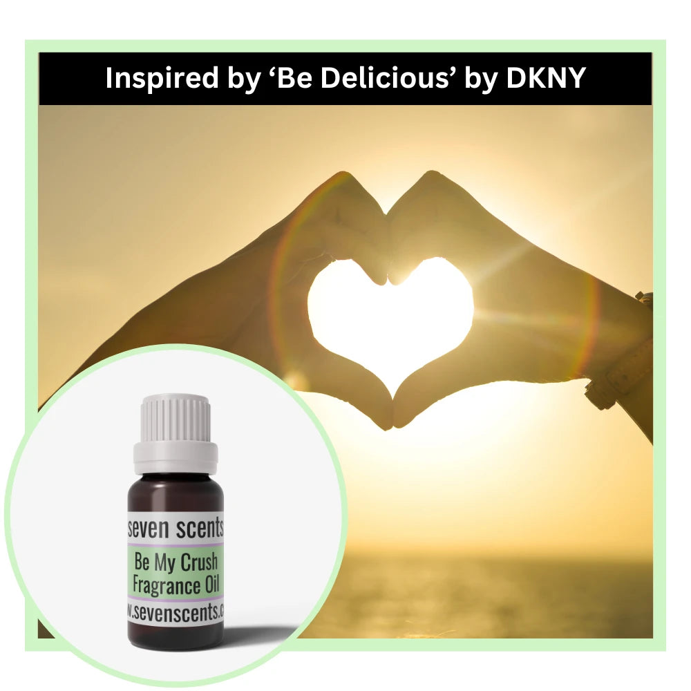 Seven Scents be my crush  fragrance oil bottle with a heart-shaped hand gesture in the background, inspired by 'Be Delicious' by DKNY.