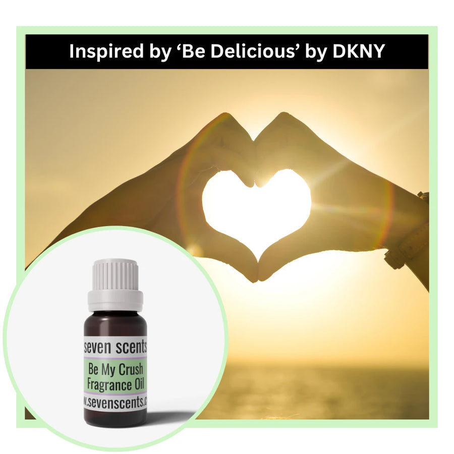 Seven Scents be my crush  fragrance oil bottle with a heart-shaped hand gesture in the background, inspired by 'Be Delicious' by DKNY.