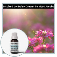 Seven Scents beautiful dream fragrance oil bottle with pink flowers in the background, inspired by 'Daisy Dream' by Marc Jacobs.