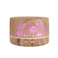 Bella aromatherapy diffuser delicate floral cutouts with LED light glowing through