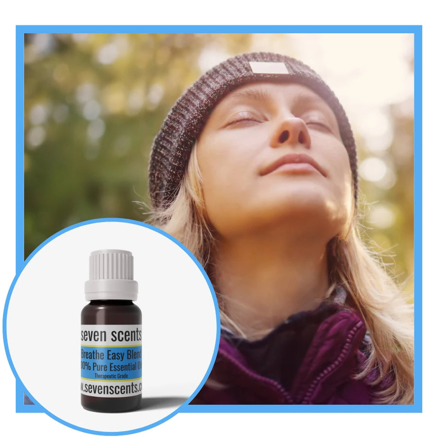 Breathe Easy essential oil blend by Seven Scents with a women deeply inhaling fresh air outside with a warm woolen hat