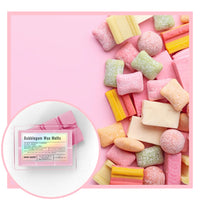 Colorful bubblegum wax melts on a pink background with a close-up of the product packaging.