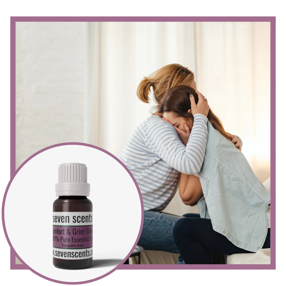 Comfort and Grief essential oil blend by Seven Scents with two people cuddling and consoling each other