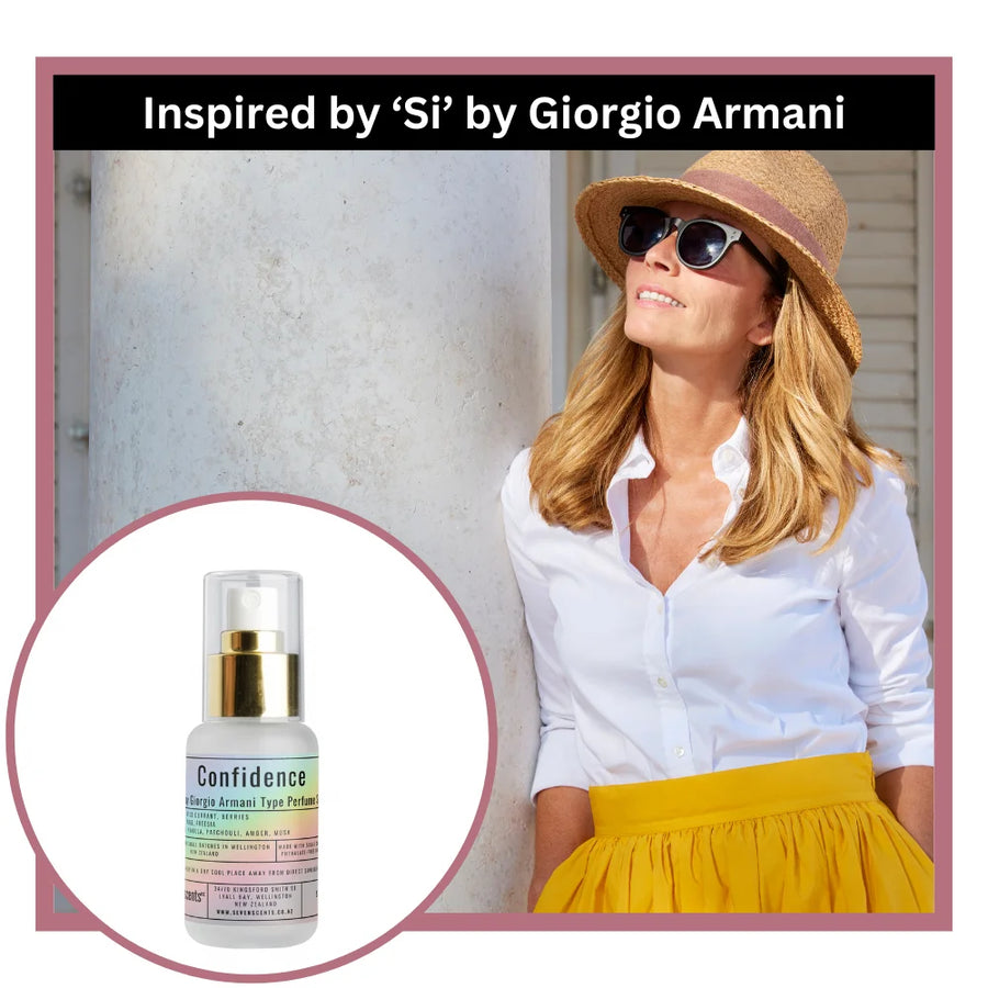 Woman wearing sunglasses and a hat with a product labeled 'Confidence' and 'Inspired by Si by Giorgio Armani'.