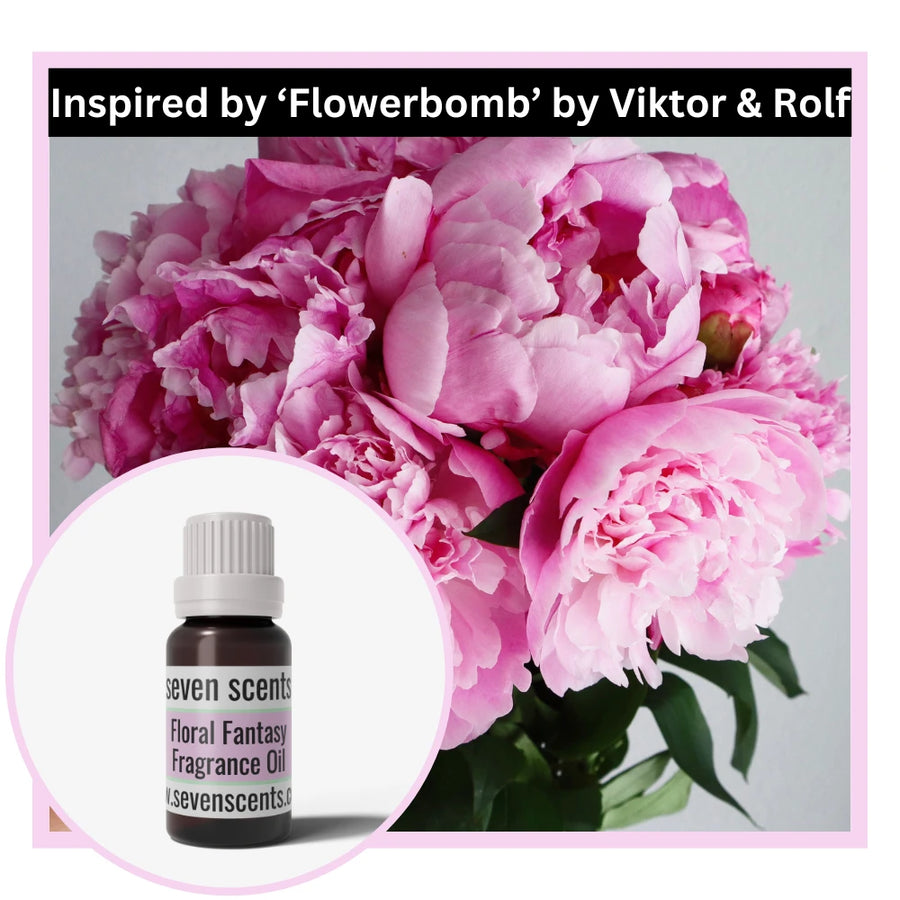 Bouquet of pink flowers with a bottle of Seven Scents floral fantasy fragrance oil inspired by Flowerbomb by Viktor & Rolf
