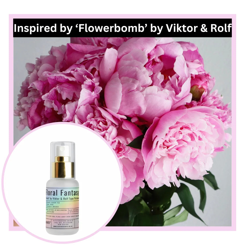 Bouquet of pink flowers with a bottle labeled 'Fioral Fantasy' inspired by 'Flowerbomb' by Viktor & Rolf.
