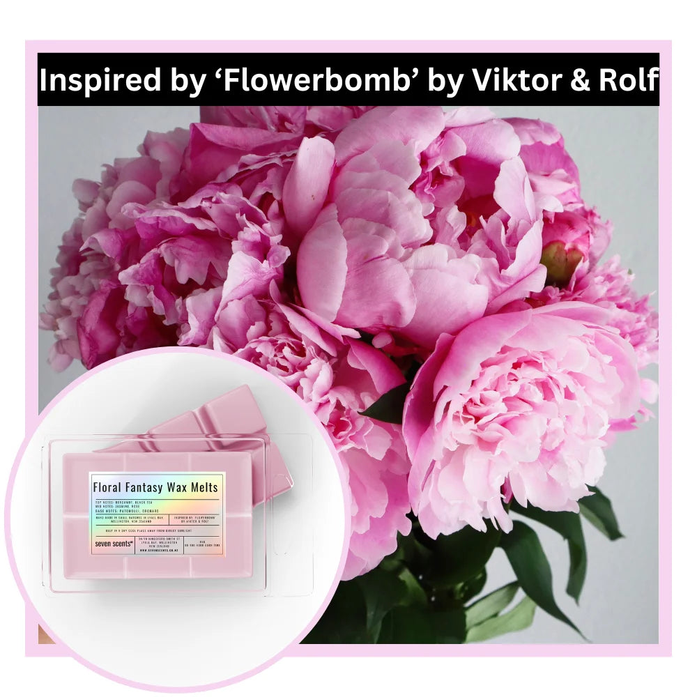 Pink flowers with a product labeled 'Floral Fantasy Wax Melts' inspired by 'Flowerbomb' by Viktor & Rolf.