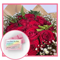 Fresh rose wax melts with fresh roses in background