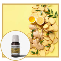 Ginger essential oil by Seven Scents with ginger and lemon slices on a yellow background
