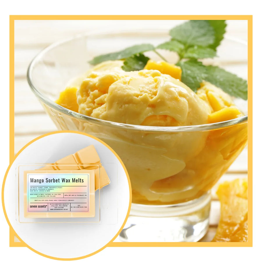 Mango sorbet ice cream in a glass bowl with mango slices and leaves, accompanied by Mango Sorbet Wax Melts packaging.