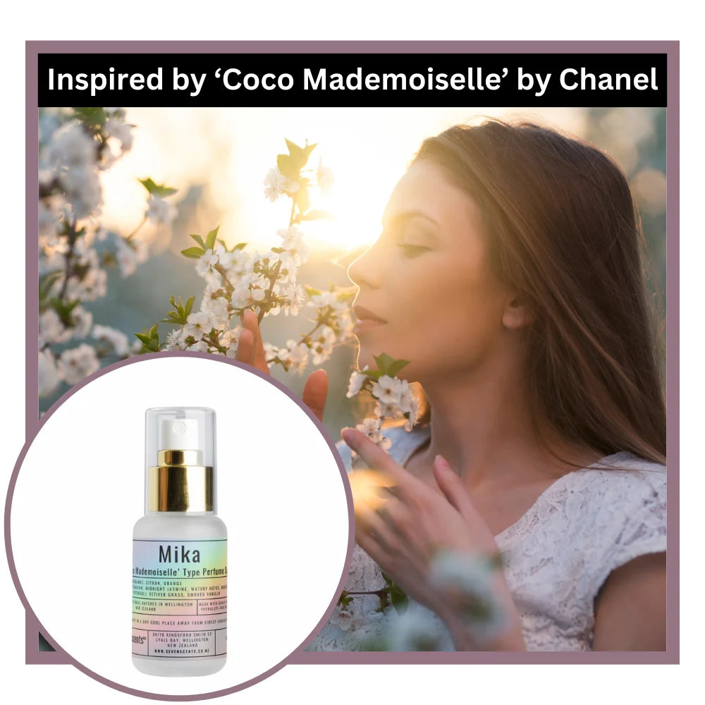 Woman smelling flowers with a Mika perfume bottle inset, inspired by 'Coco Mademoiselle' by Chanel.