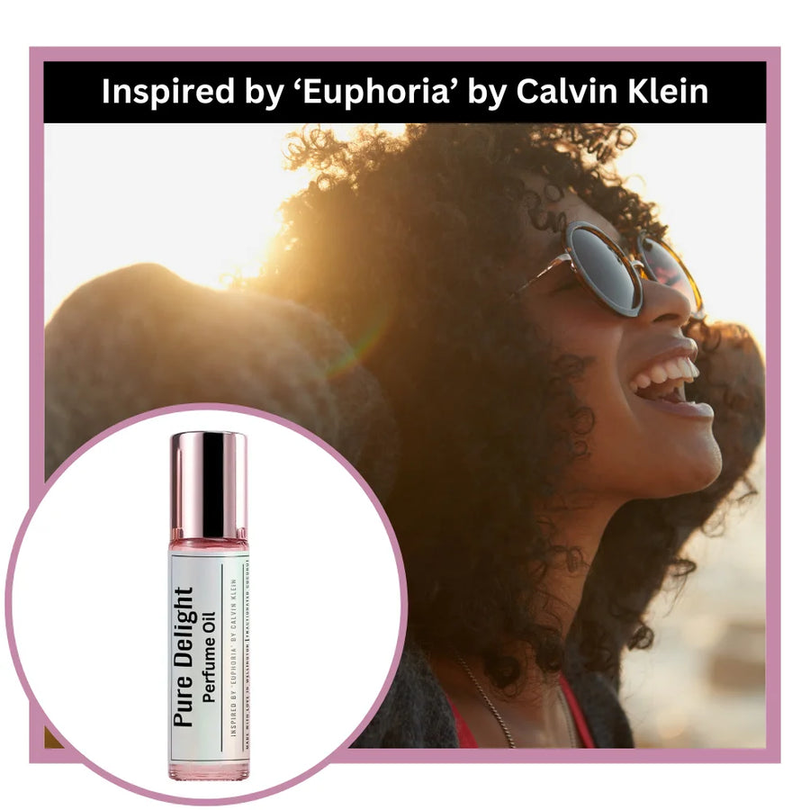 Pure delight perfume oil inspired by Euphoria by Calvin Klein with a woman with sunglasses smiling outdoors