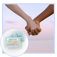 Two hands holding each other with a close-up of Sensual Wax Melts packaging.